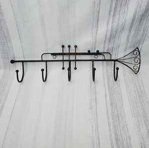 DecorativeIron Trumpet Shape Wall Hook Black w/hints of gold. 21" long